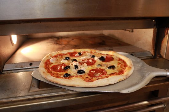 how to cook in a gas pizza oven？